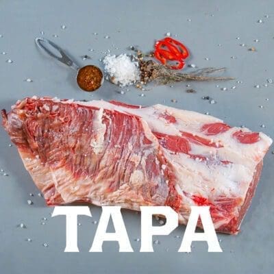 Tapa de asado sobre fondo gris